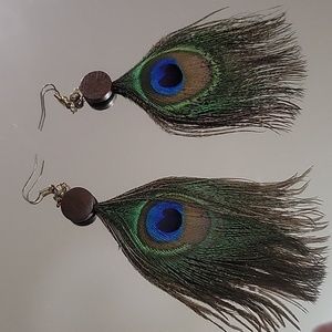 Long Peacock feather earrings with pyrite gold and wooden accents handmade